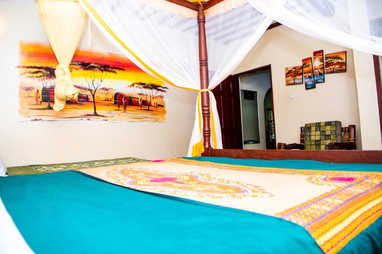 Oasis Diani Beach Villas Esterno foto