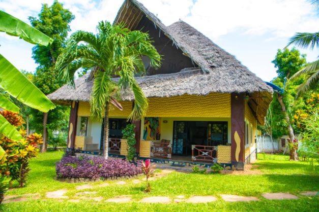 Oasis Diani Beach Villas Esterno foto